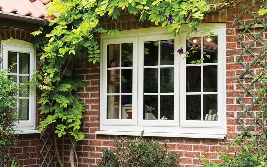 White uPVC casement window with astragal bars